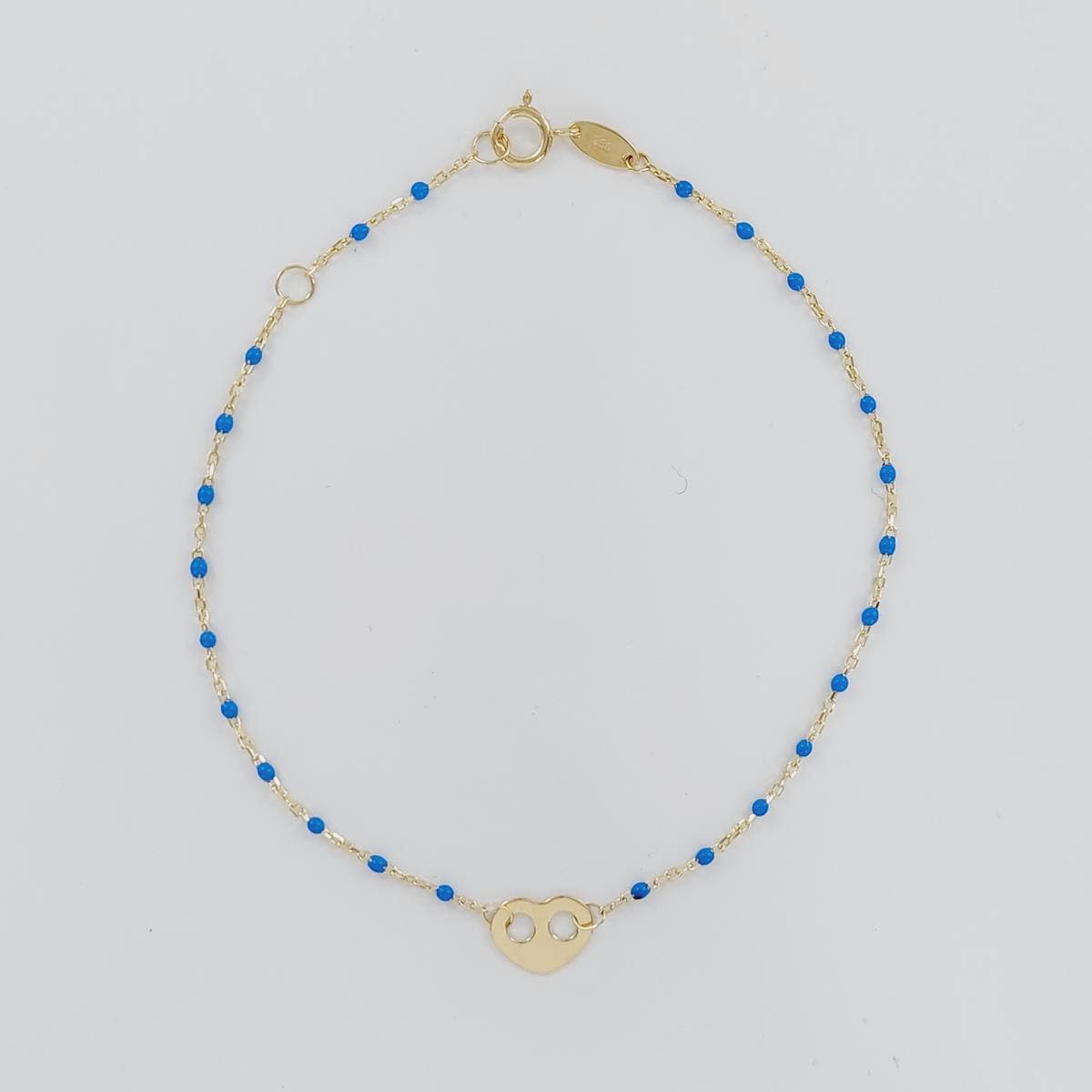 Pulsera bolas azules y corazon