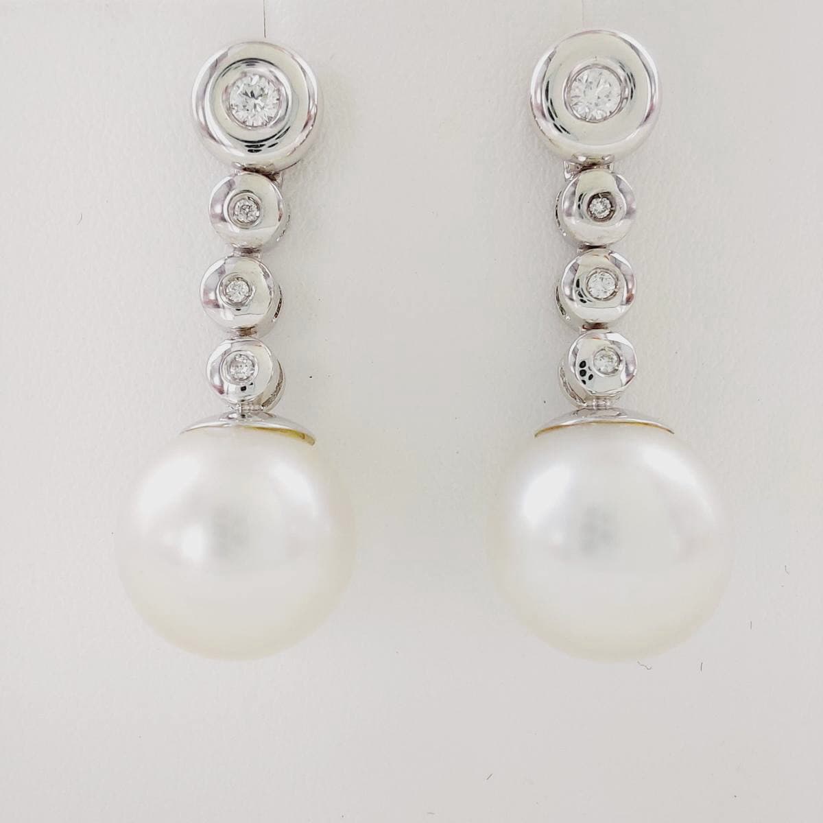 Pendientes brillante y perla australiana